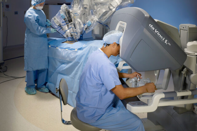 Physician operating the da Vinci robotic surgery system