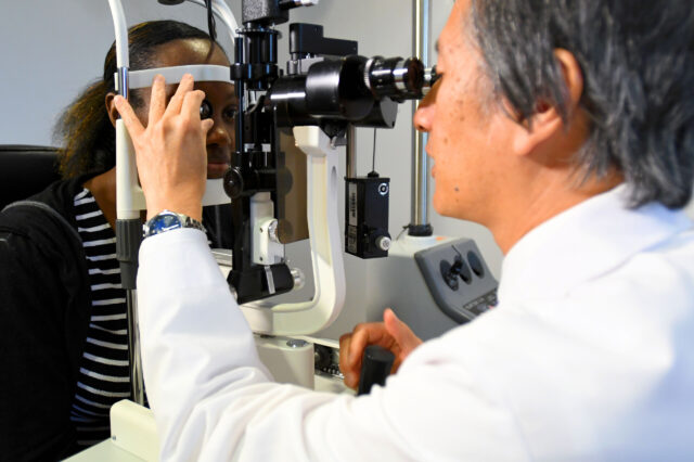 Dr. Darrell WuDunn tests a patient for glaucoma at UF Health Ophthalmology - Jacksonville.