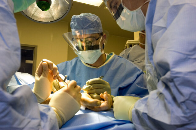Orthopaedic surgeons operate on a patient's wrist