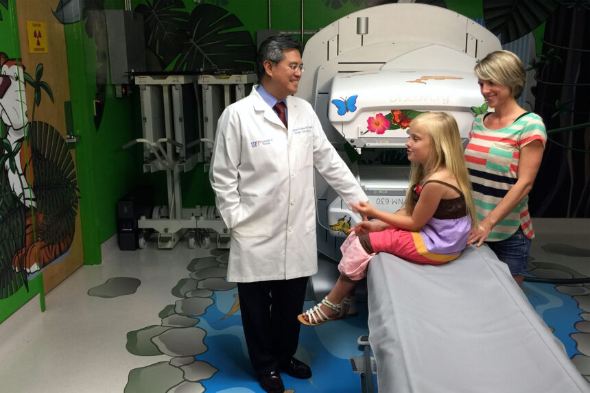 Dr. Aldana meets with a pediatric neurosurgery patient