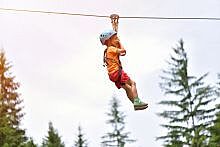 Young boy on a zipline