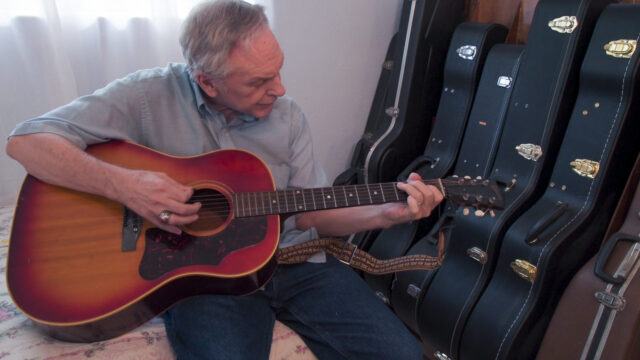 John Clemens playing guitar