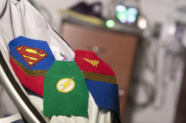 Superhero logos for baby costumes