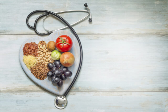 Stethoscope surrounding healthy food choices