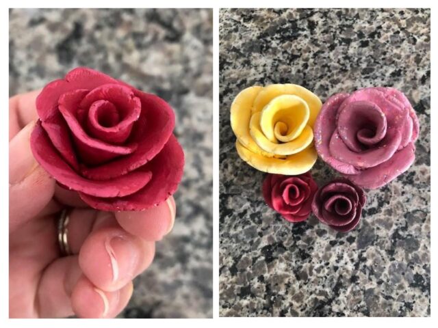 Clay roses painted in red, yellow and pink