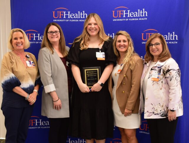 Dr. Jeanne Rabalais, a chief resident in the department of emergency medicine, received the Trainee Award.