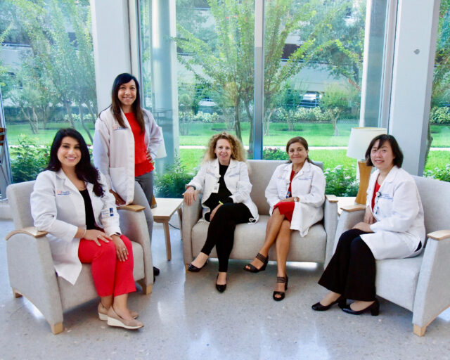 Women’s Cardiovascular Program cardiologists and nurse practitioners seated together