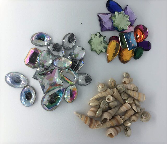 Gems, jeweled objects and shells